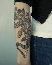 35 Amazing Rattlesnake Tattoo Designs Ideas February 2020 Rattlesnake Tattoo Snake Tattoo Design Best Tattoos For Women