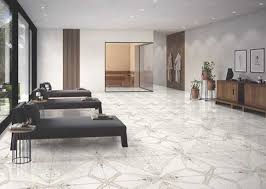 A patterned, hardwood floor is one of the best living room flooring ideas for rooms with clean, simple furniture. Zui Voif3stkym