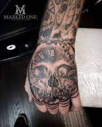 Masculine Hand Tattoo By Gav Guest Skull And Clock Tattoo Hand Tattoos Hand Tattoos For Guys Skull Hand Tattoo