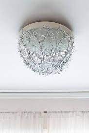 How To Make A Diy Chandelier In An Hour More Diy Chandelier Diy Apartment Decor Diy Lighting