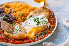 In 1858 it was described as a green chile pepper stuffed with minced meat and coated with eggs. Chile Relleno Recipe Traditional Mexican Recipe Eating Richly