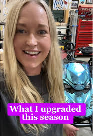 Loading Snowmobile with Skid Loader