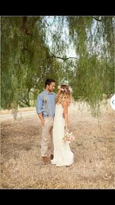 Brautkleid sommerhochzeit spitzenoberteil tüllrock tiefer rücken schulterfrei; Frisuren 2021 Beauty Kurzhaarfrisuren Haarfarben Haarschnitte Hochzeit Kleidung Hochzeit Hochzeit Brautigam