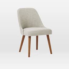 Mid Century Upholstered Dining Chair Wood Legs Ashwood 'fish hook' modern arm chair mounted on wooden frame and reinforced with solid supports.