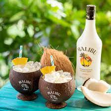 An easy recipe for a refreshing and tasty pina colada cocktail with malibu rum, coconut cream and pineapple juice, garnished with fresh pineapple. Malibu Cocktails To Make This National Pina Colada Day Chilled Magazine