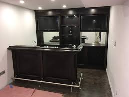 This Custom Home Bar Utilizes The Customer S Available Space In Their Basement To Create An Amazing Ente Custom Home Bars Bar Interior Design Workout Room Home