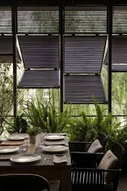 Continue to 12 of 15 below. Kitchen Covet Restaurant Spaces Outdoor Shutters House Design Home