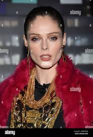 Model Coco Rocha attends the Moschino x H&M fashion show at Pier 36