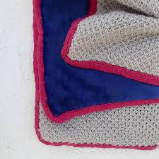 Secure the base of the ribbon ties with a few stitches. Lining A Knit Blanket With Fleece Foxflat