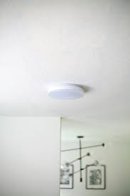 We currently have 2 fluorescent light fixtures in the ceiling above a pot rack, which is above our island. How To Replace A Fluorescent Light With An Led Flush Mount Kitchen Update Tutorial Create Enjoy