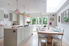 Expansive traditional kitchen in north west. Farrow And Ball Elephants Breath Kitchen Transitional With Window Mirror Geometric S Shaker Style Kitchen Cabinets Kitchen Cabinet Styles Kitchen Cabinet Doors