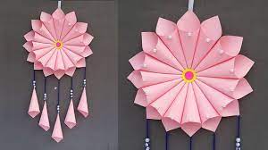 You can also use straws to make stems. Colors Paper Paper Wall Decor Diy Wall Hanging Craft Ideas Room Decorating Ideas With Paper Craft Flowers