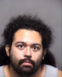 Gabriel Larralde Isaac, Jr., 25, allegedly attacked a family member  viciously earlier this week, hitting them in the head and then trying to  choke them out. He has since been arrested. STORY: