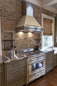 Antique Brick Wall And Stainless Steel Countertops By Concetta Brick Kitchen Brick Wall Kitchen Kitchen Remodel