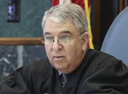 2 men accused of grappling with law enforcement officers in court in  Harrison, WV