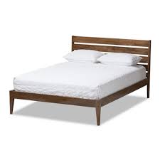 Its unobtrusive design uses a recessed base with an overhanging platform to make it visually light. Elmdon Mid Century Modern Solid Wood Slatted Headboard Style Platform Bed Queen Brown Baxton Studio Target