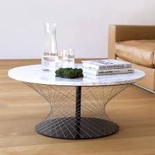 This accent coffee table is the perfect option for any sleek modern living room. Contemporary Coffee Table Network Favius Wire Mesh Marble Steel Base