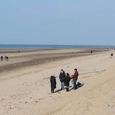 The three men have been taken to hospital by air ambulance for treatment. Crowds Flock In The Sunshine To Formby Beach But Find There S No Beach Manchester Evening News