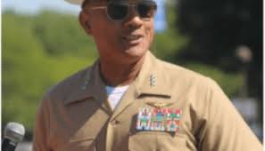 Graduates Trading Books for Uniforms and Service