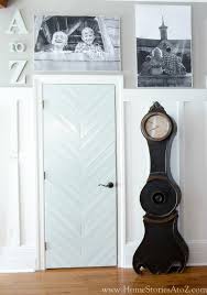 We went to lowe's and bought the wood, it required tongue and groove and 1x4's and 1x6's. Diy Herringbone Door Tutorial