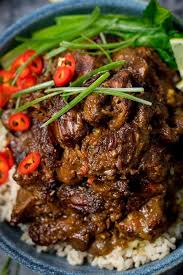 Prepare for your house to be filled with an indescribable aroma! Beef Rendang Slow Cooked Fall Apart Spicy Beef With A Touch Of Heat Rendang Beefrendang Indonesianf Beef Rendang Slow Cooker Beef Recipes Cooking Recipes
