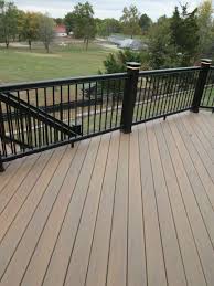Real Wood Vs Deck That Look Like Wood Outdoor Living Trends Outdoor Living Composite Decking
