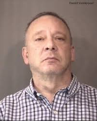 Police: Man shoots wall, fires at officer over alarm system