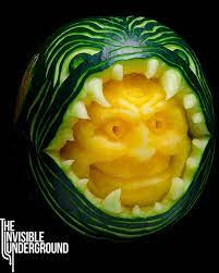 Fruits And Vegetables Carved Set The Tone For Halloween Fruit And Vegetable Carving Vegetable Carving Food Sculpture