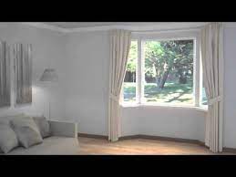 Bay window rods are hinged to fit the shape of the windows, simplifying installation. How To Dress Windows Bay Windows With Curtains Blinds Youtube