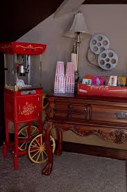Instead, choose simple décor to complement the theme of the room. Popcorn Theater Room Decor Home Theater Seating At Home Movie Theater