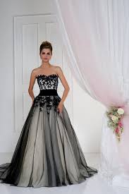 Not only are black wedding dresses sleek and stylish, they're also very versatile and can easily be worn again and again long after you say i do. how can i accessorize my black wedding dress? Plus Size Wedding Dresses Black And White Plus Size Wedding Dress