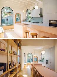 This Contemporary Art Deco Inspired House Addition Adds Color Light And Curves Art Deco Kitchen Art Deco Interior Design Art Deco Home