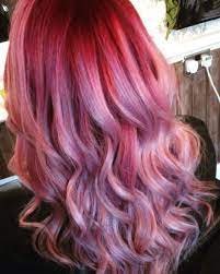 Dark Pink Roots With Pastel Pink Ends And Lavender Highlights The Stylist Hair Salon Hair Highlights Hair Color Red Highlights Hair Color Pink