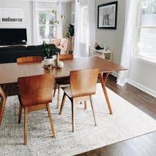White lacquer finish over an engineered wood body. Modern Furniture Home Decor Home Accessories West Elm Modern Dining Room Tables Midcentury Modern Dining Table Modern Kitchen Tables