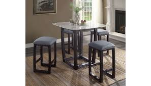 This pub table stands at bar height making it perfect for bar stools and people standing for a chat. Hilma Marble Top Pub Table Set