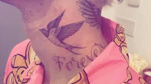 This is bieber's korean mask tattoo. Fur Ehefrau Hailey Justin Bieber Hat Neues Forever Tattoo Promiflash De