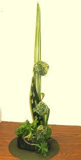 Creative Line Design With Manipulated Flax Creative Flower Arrangements Floral Art Arrangements Contemporary Flower Arrangements
