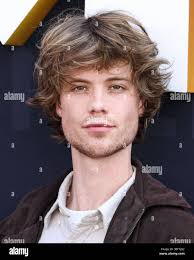 Celebrity actor beige jacket white shirt hi-res stock photography and  images