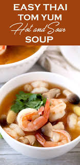 Close Up View Of A Bowl Of Thai Tom Yum Soup With Plump Shrimp Straw Mushrooms Lemongrass And Cilantro On A Tom Yum Soup Hot And Sour Soup Thai Tom