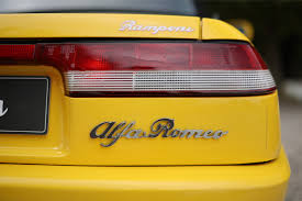 Image result for Canary Yellow 1985 Alfa-Romeo