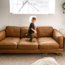It is often chosen due to its good lasting performance and natural appearance, depending on timber type/grade. Tan Leather Sofa Timber Charme Tan Sofa Article Leather Sofa Living Room Tan Sofa Leather Couches Living Room