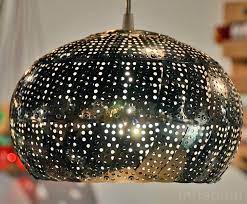 Decorate lighting fixtures with elegant shades. Nadia Belalia Transforms Simple Steel Steamers Into Stunning Lamps