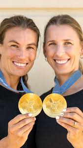 Lucy Spoors and Brooke Francis made history at the Paris 2024 Olympic  Games, becoming the first rowing crew of mothers to win gold., After  earning silver medals at Tokyo 2020