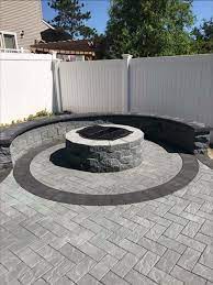 This Cambridge Pavingstones With Armortec Fire Pit Is Perfect For Summer Nights Installation Jesco Brick Fire Pit Backyard Backyard Fire Outdoor Fire Pit