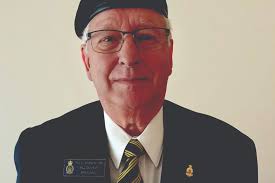 Airdrie legion president receives 50-year service medal