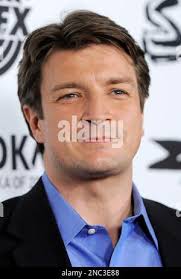 Nathan Fillion, a cast member in "Super," poses at the premiere of the film  in Los Angeles, Monday, March 21, 2011. (AP Photo/Chris Pizzello Stock  Photo