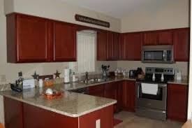 The cabinets which you already have can be combined with these cabinets, and it would not have any. Simple Yet Elegant Kitchen In A Deep Cranberry Stain Kitchen Cabinets Elegant Kitchens Kitchen