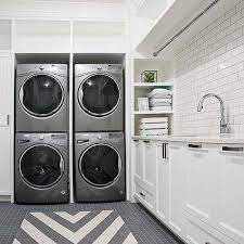 I personaly have had both, and i prefer the ones we have now bcuz they wash bigger loads. Washers And Dryers Surrounded By Cabinets Design Ideas