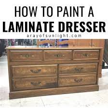 With either the true or faux whitewash applications, brush in the direction of the grain. How To Paint A Laminate Dresser