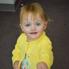 Isn't she just adorable? She has got the sweetest personality and I don't  think she ever met a stranger. Mom and dad are going to get lots of love  and cuddles from